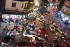 Image of vehicles in a bustling intersection 